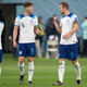 Harry Kane of England speaks with John Stones during the FIFA World Cup Qatar 2022 Group B match between England and IR Iran at Khalifa International Stadium on November 21.